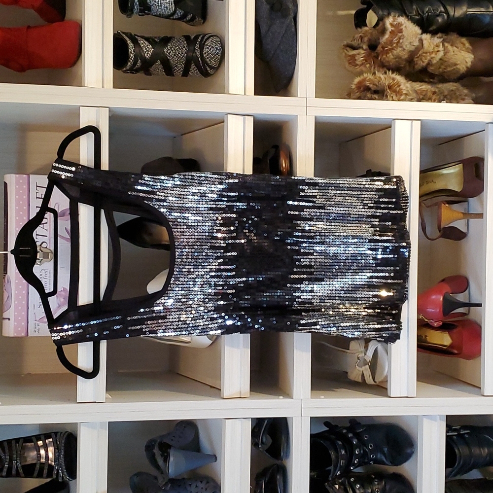 Black sequined sleeveless blouse
